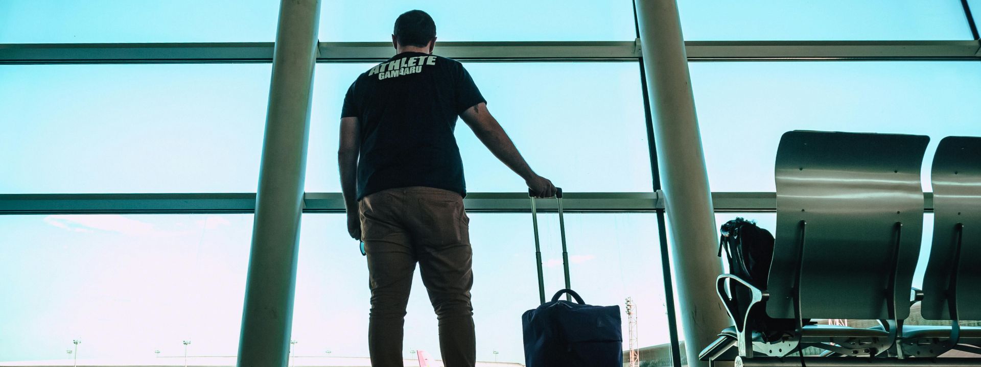 Man Holding Luggage Bag